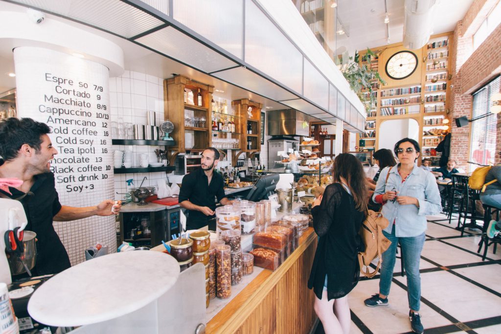 Woman standing on food counter