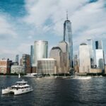 Freedom Tower under blue and white sky during daytime